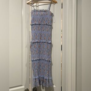 Light blue floral spaghetti strap smocked midi dress. Worn once. Spring